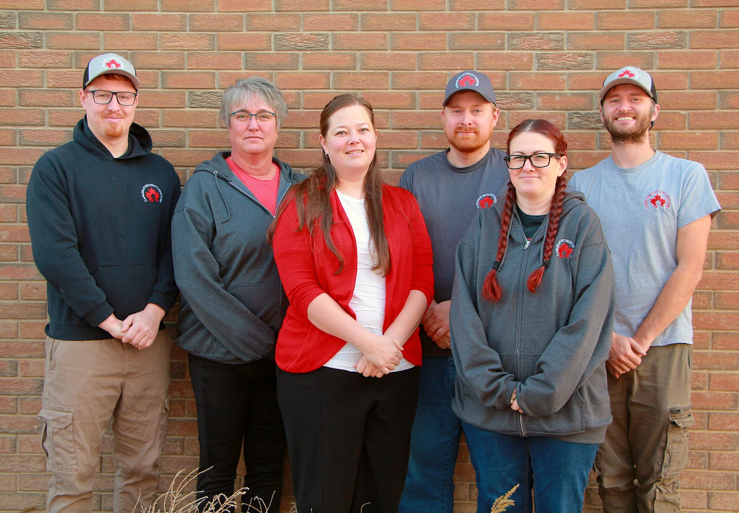 Employees of Canadian Security Systems in a group shot